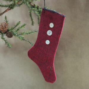 primitive red stocking with white vintage buttons
