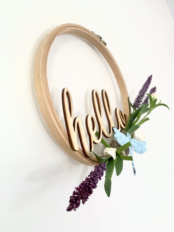 embroidery hoop hello sign with dragonfly and lavender sprigs angle